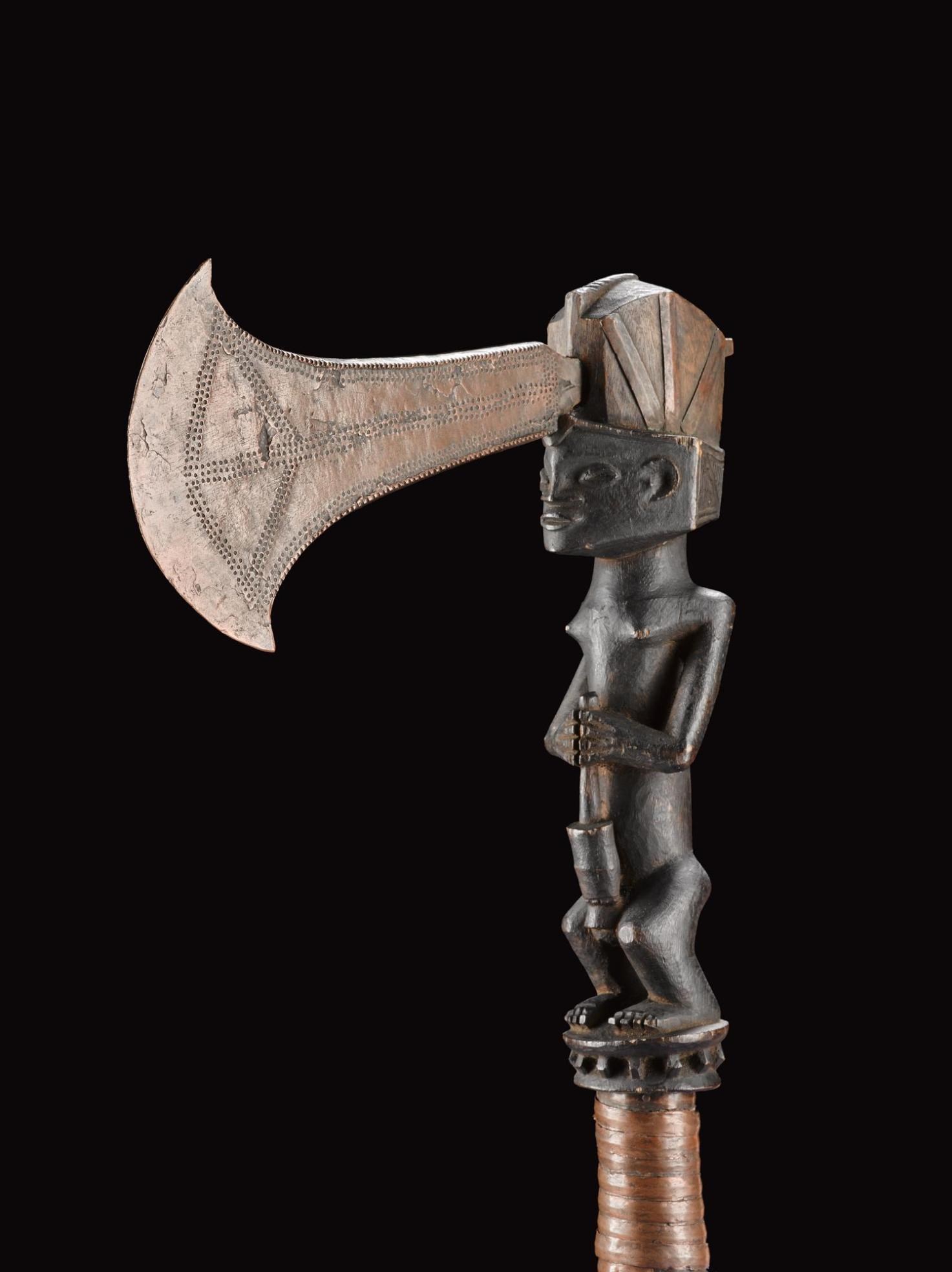 Ceremonial axe with copper blade, wooden shaft carved in the form of a woman pounding grain and grip bound in copper ribbon: Central Africa, Democratic Republic of the Congo, Katanga, late 19th century