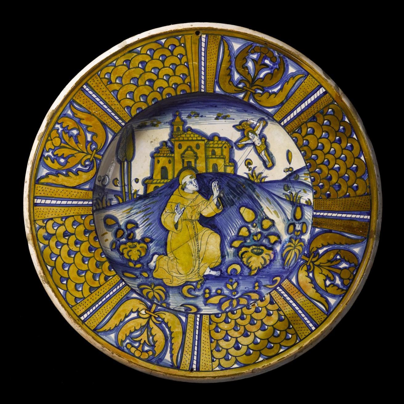 This 16th-century maiolica dish from Italy shows St Francis of Assisi.