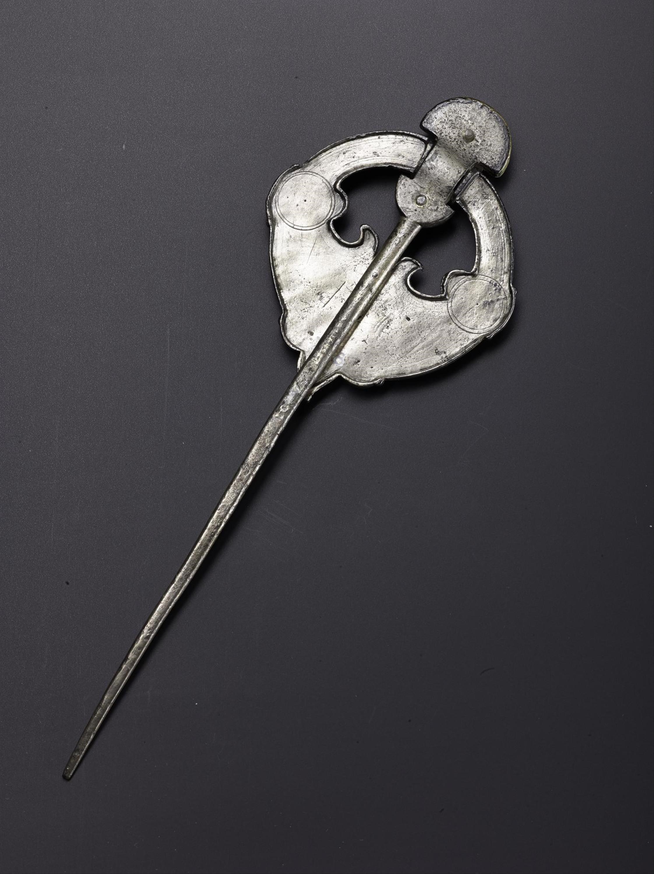 The reverse of the brooch-pin.