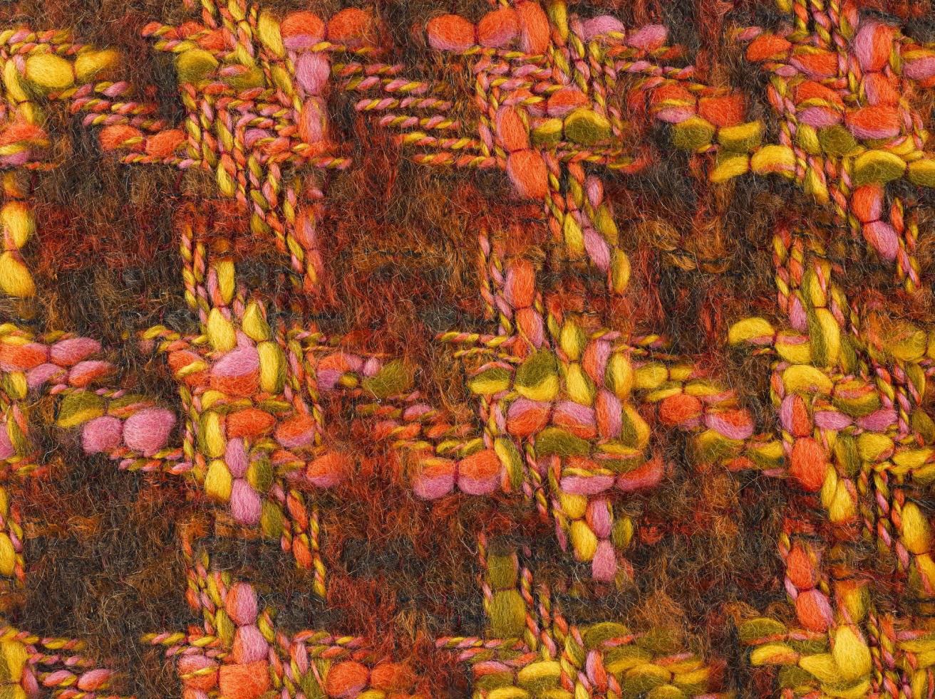 Sample of woven space-dyed mohair tweed entitled Maple, in yellow, pink, orange and light and dark brown.