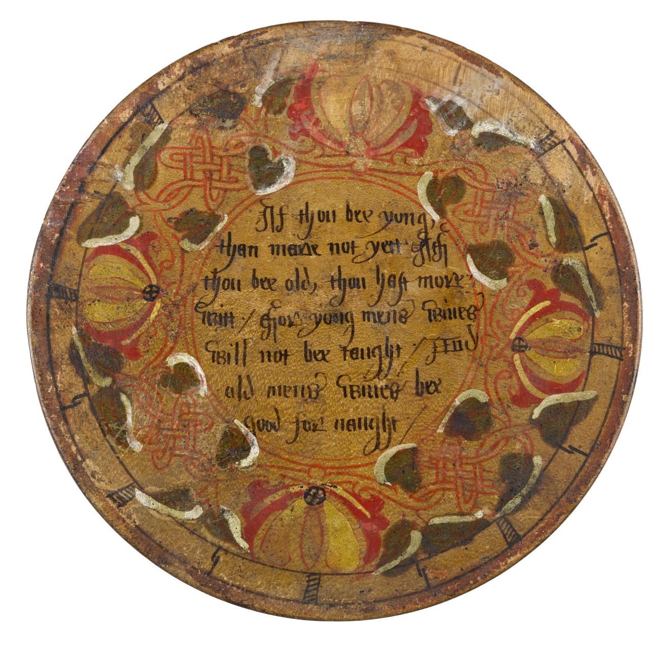 Decorated lid of box containing beechwood desert plates
