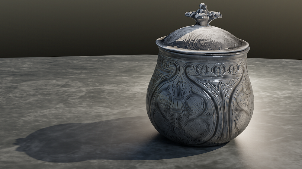Digital scan of the Galloway Hoard silver vessel in full with lid on, placed on a marble table