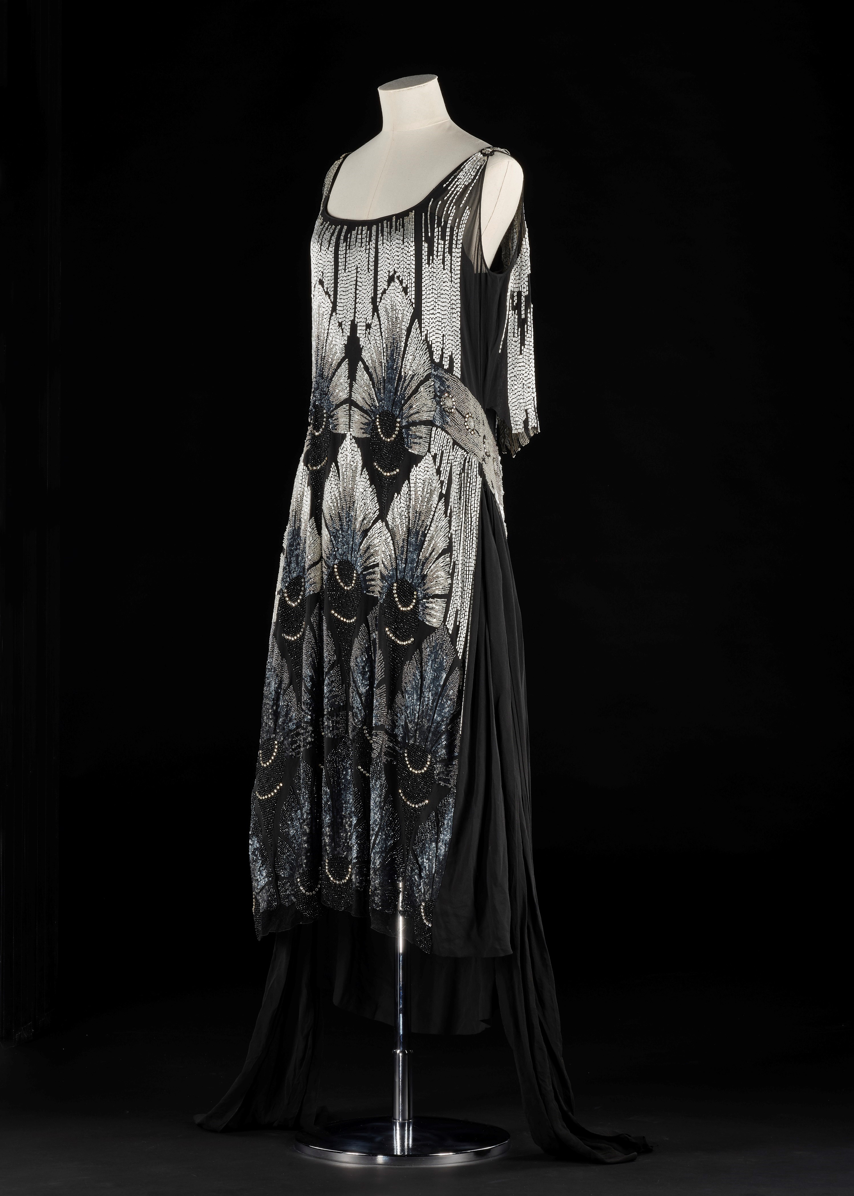Mannequin wearing a woman's evening dress by an unknown designer