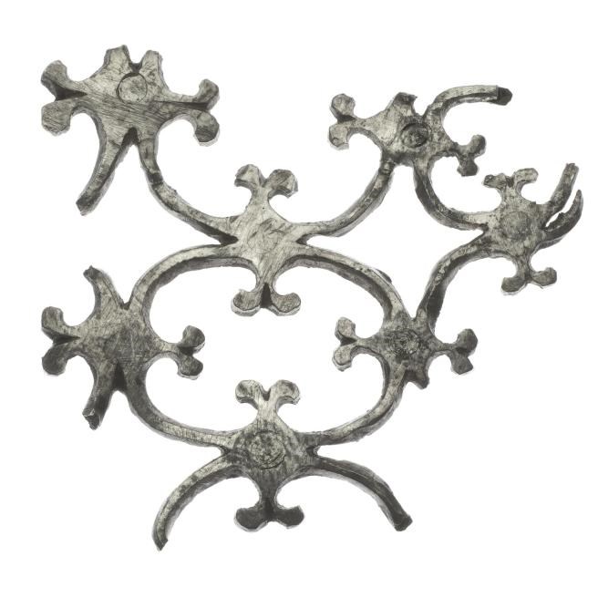 Lattice-like silver fragment of burst designs connected by slender silver arms.