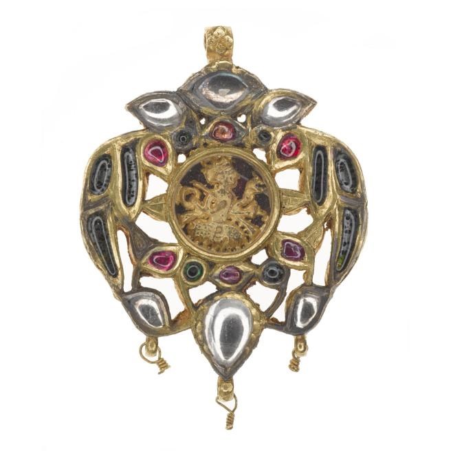 Gilded silver pendant depicting a Hindu deity with rock crystals, rubies, and glass stones