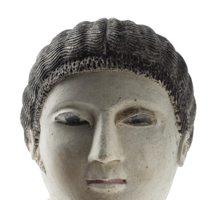 Figure / woman's head