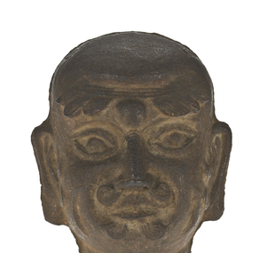 Figure / monk head