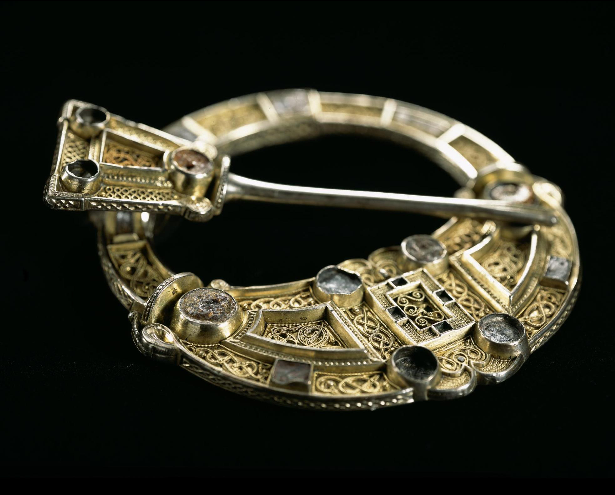 Hunterston Brooch, an early Christian brooch with panels of gold filigree in Celtic and Anglo-Saxon styles, c. 700 AD.