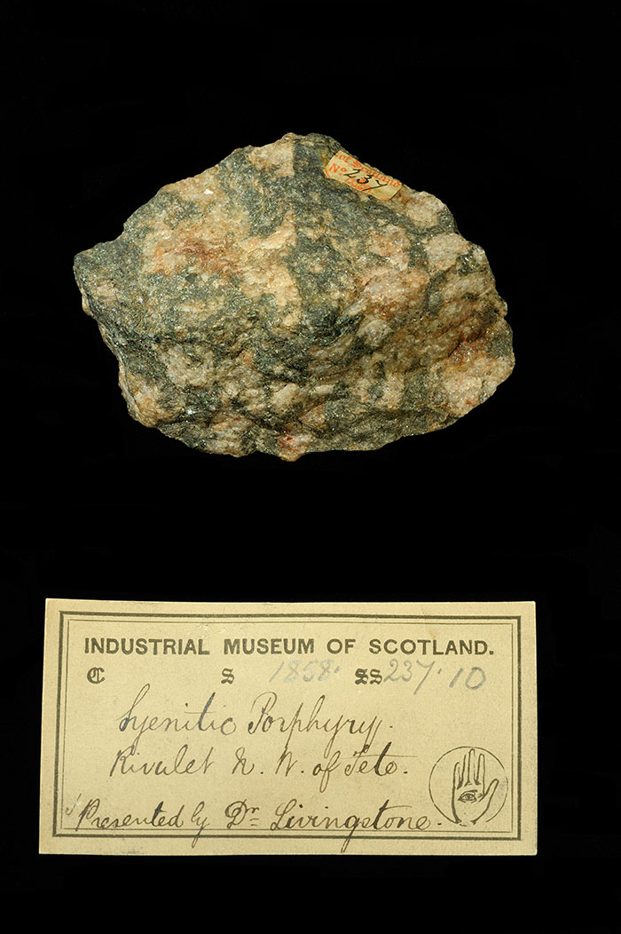 Specimen of syenitic porphyry with 19th century museum label: ‘Syenitic porphyry. Rivulet NW of Tete. Presented by Dr Livingstone.’