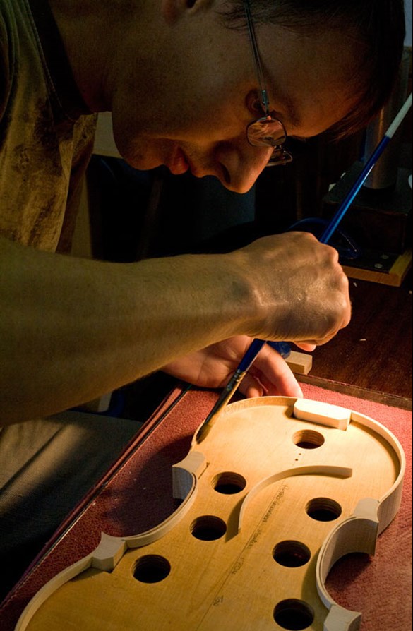 Ewen Thomson making the Shetland fiddle. Image © Billy Fox.