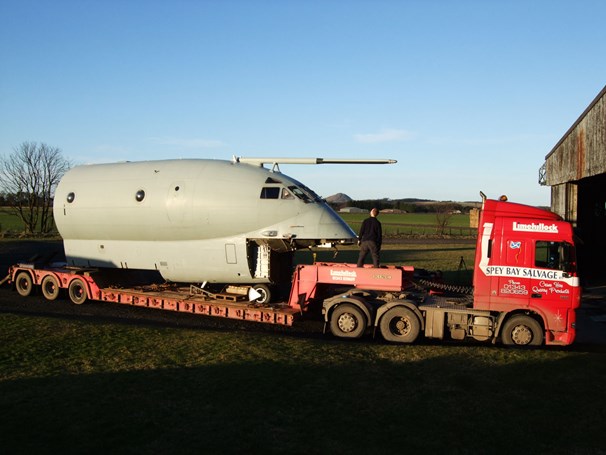 The Nimrod fuselage arriving at the National Museum of Flight.