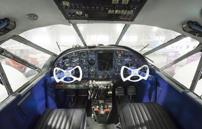 The cockpit of a Beech E-18S aircraft.