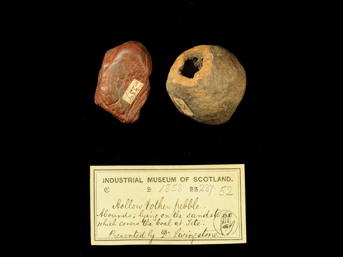 Specimen of a hollowed rock with 19th century museum label: ‘Hollow & other pebble. Abounds lying on the sandstone which covers the coal at Tete. Presented by Dr Livingstone.’