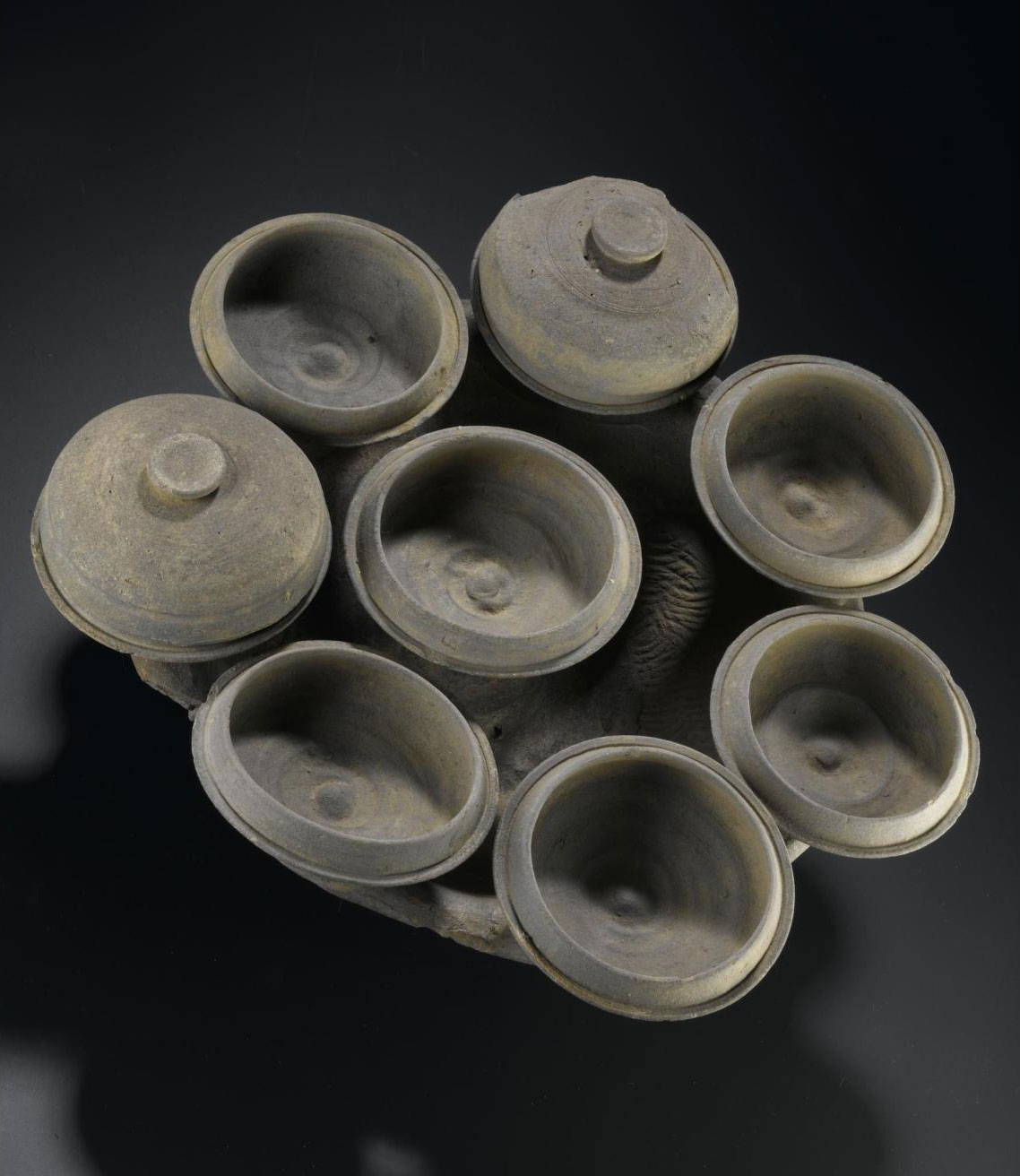 Cluster of grey stoneware dishes: Japan, Yamato Province, Dolmen period.