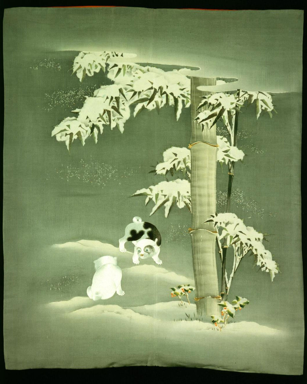 Silk fukusa (gift cover) with a design of two puppies beneath bamboo and holly in the snow: Japan, 1868-1900.