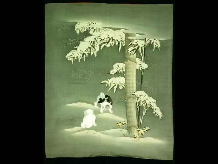 Silk fukusa (gift cover) with a design of two puppies beneath bamboo and holly in the snow: Japan, 1868-1900.