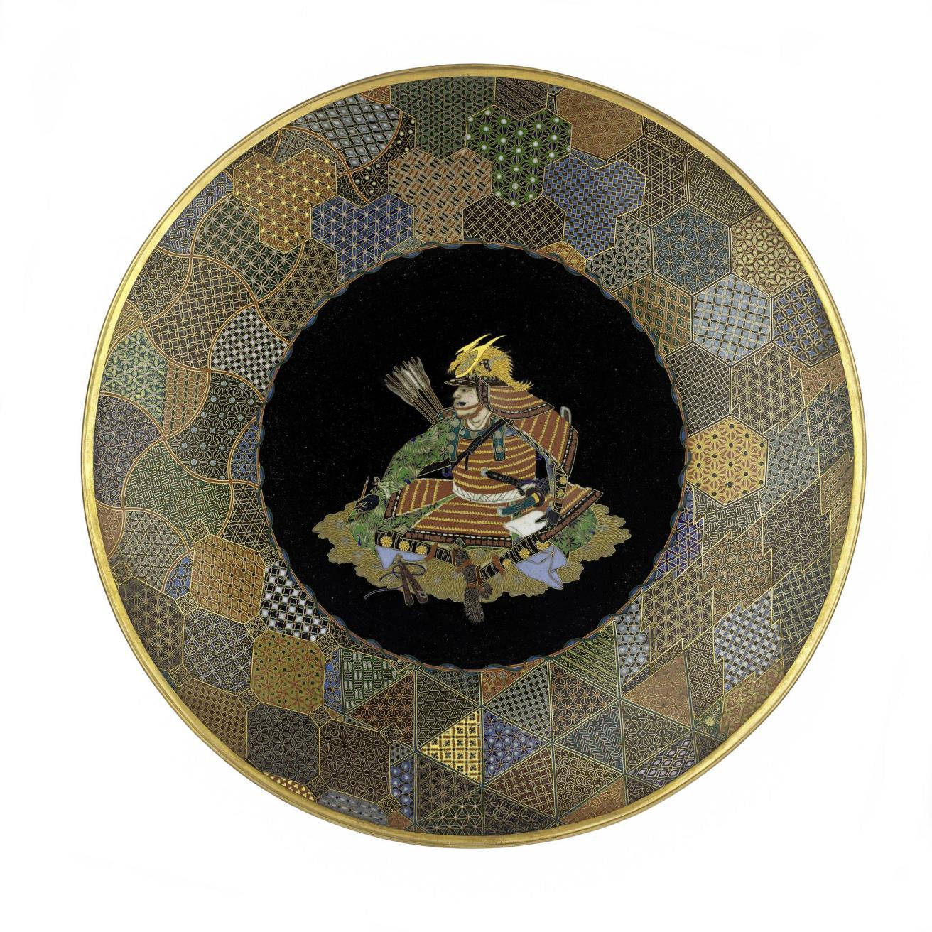 Dish of copper and cloisonne enamel with a seated figure of a warrior in centre: Japan, Yokohama, by Goto Seizaburo, c1880.