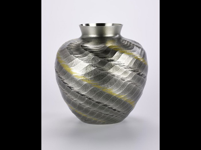 Vase entitled Kuroshio, of hammered silver with nunome-zogan (textile-imprint inlay) of gold and lead: Japan, by Ōsumi Yukie, 2000.