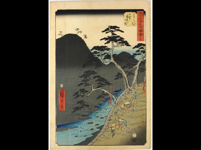 Colour woodblock print number 11 entitled Hakone: yamanaka yako no zue (Hakone: Night Travel in the Mountains) from the series Gojūsan tsugi meisho zue (Famous Places Along the 53 Stations [of the Tōkaidō] Illustrated) depicting an evening scene of travellers, some being carried in palanquins and others bearing torches, as they pass through the mountains: Japan, by Utagawa Hiroshige, 1855.