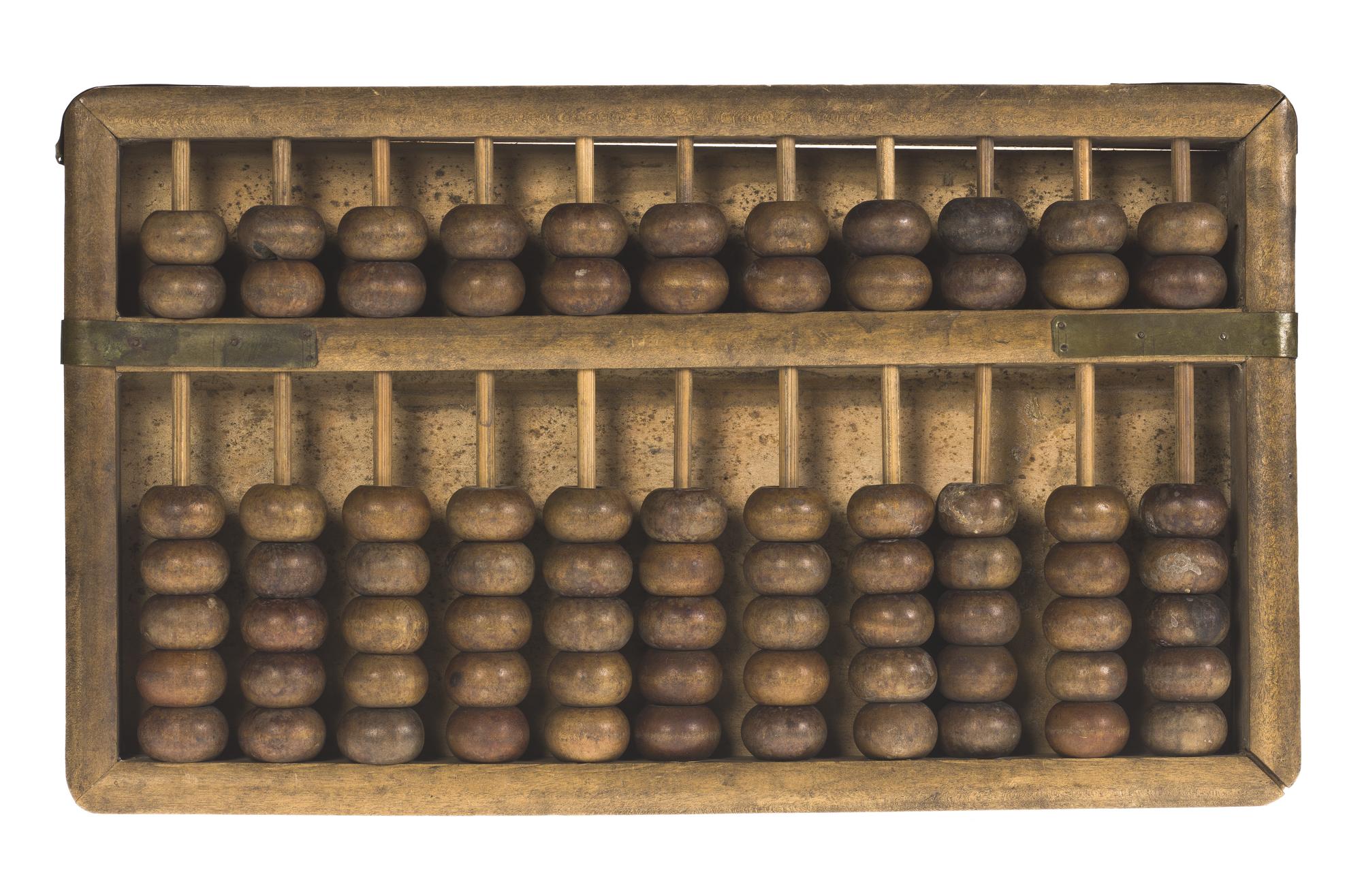 Suanpan (abacus) of wood and brass, used for both decimal and hexadecimal calculations: China, Qing Dynasty, early 20th century.