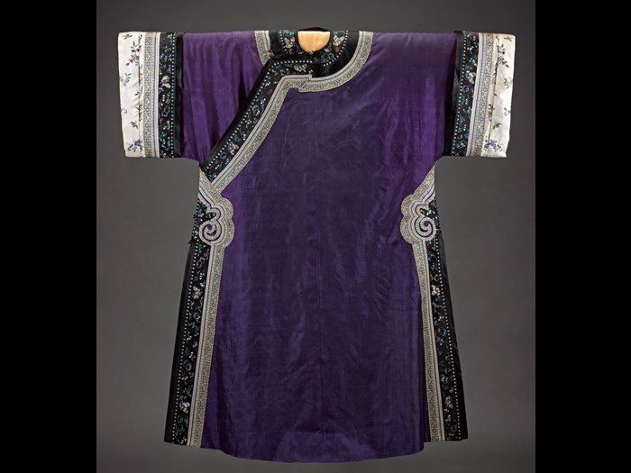 Robe (changfu) of embroidered silk, worn by a married Manchu woman: China, Qing Dynasty, 19th century AD. Lent by Her Majesty the Queen.