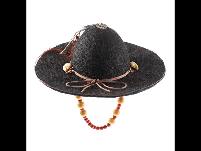 Royal courier's hat (jeonrip) made of cow-hair with a chin-band of beads, a peacock feather and red cord: Korea.
