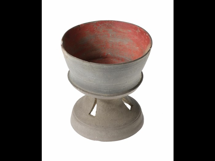 Cup of stoneware, with a high perforated foot, and a hematite covered interior, excavated in Nara Prefecture, Japan: Korea, Three Kingdoms period, 5th - 6th century AD.