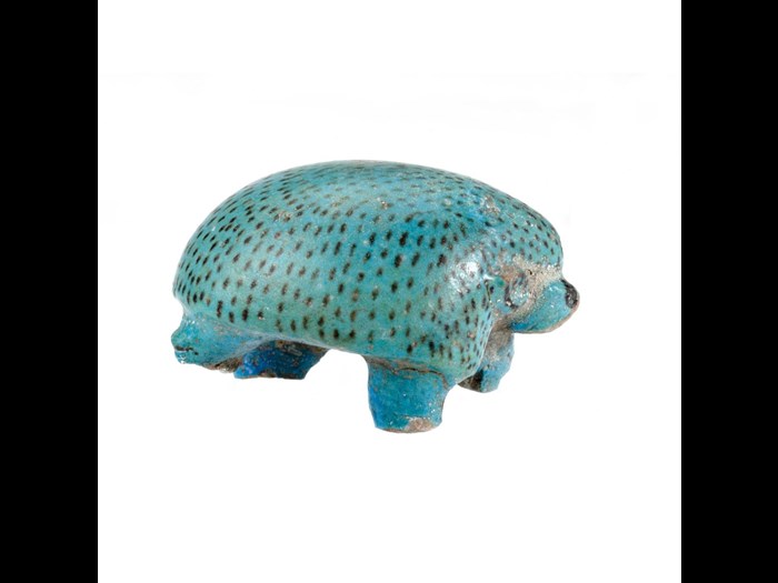  Figurine of a hedghog in a marching pose, made of blue faience with the quills indicated by brown flecks: Ancient Egyptian, Middle Kingdom.