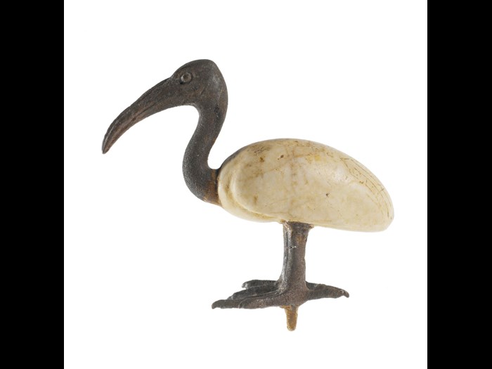 Votive statuette in the form of an ibis, the body made of calcite and the head and legs of bronze: Ancient Egyptian, Late Period.