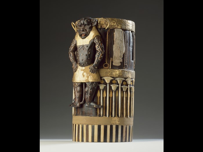 Box of cedar wood with ebony veneers and ivory inlays and gilding depicting the god Bes and bearing the cartouches of Amenhotep II: Ancient Egyptian, New Kingdom, 18th Dynasty, c.1427-1400 BC.