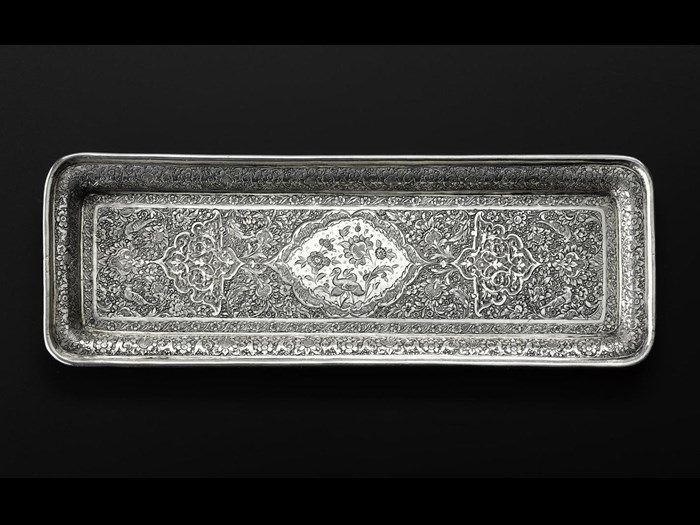 Rectangular tray of silver with a chased pattern consisting of birds and stylized floral motifs, hallmarked on the reverse: Iran, probably Isfahan, 1920s-1940s, acc. no V.2015.65