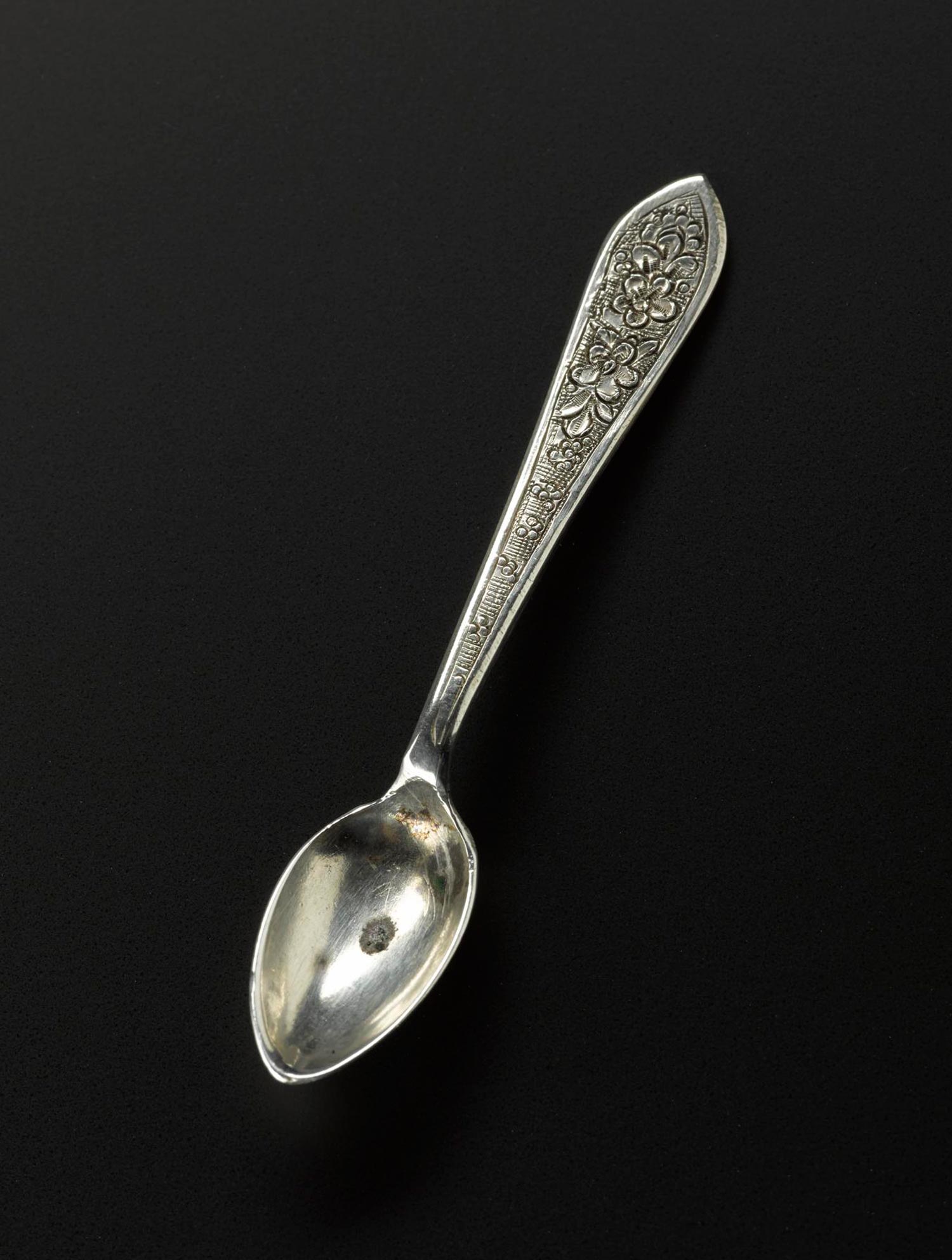 Spoon of silver with floral decoration on the handle, used as part of a set with a bowl, Iran, probably Isfahan, 1920s-1940s, acc. no V.2015.69.2