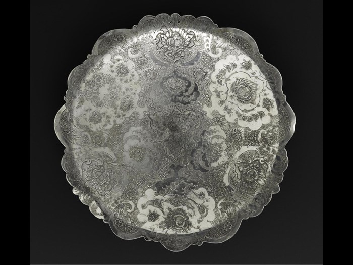 Circular dish of silver, shallow, engraved with floral decoration and two birds, hallmarked on the reverse, Iran, probably Isfahan, 1920s-1940s, acc. no V.2015.59
