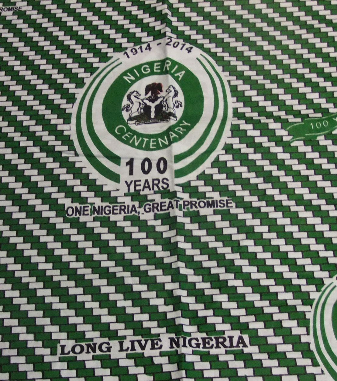 Cotton cloth printed to commemorate 'Nigeria100', marking the centenary of the merger between Northern and Southern Nigeria: Africa, West Africa, Nigeria, 2014.