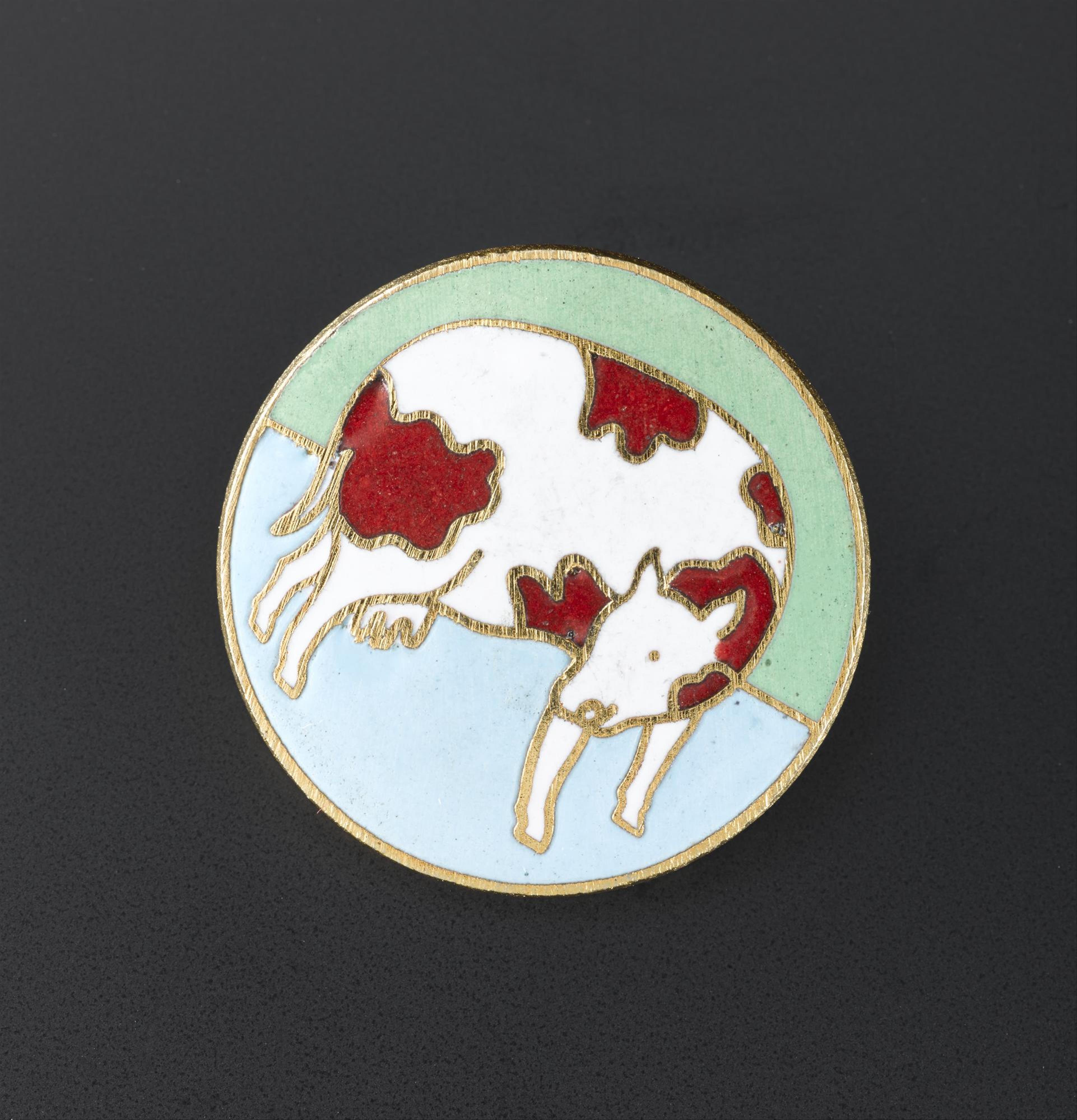 Button featuring a cow motif in enamel, possibly on silver gilt: British, by Marks of Distinction for Jean Muir Ltd, c.1972. 