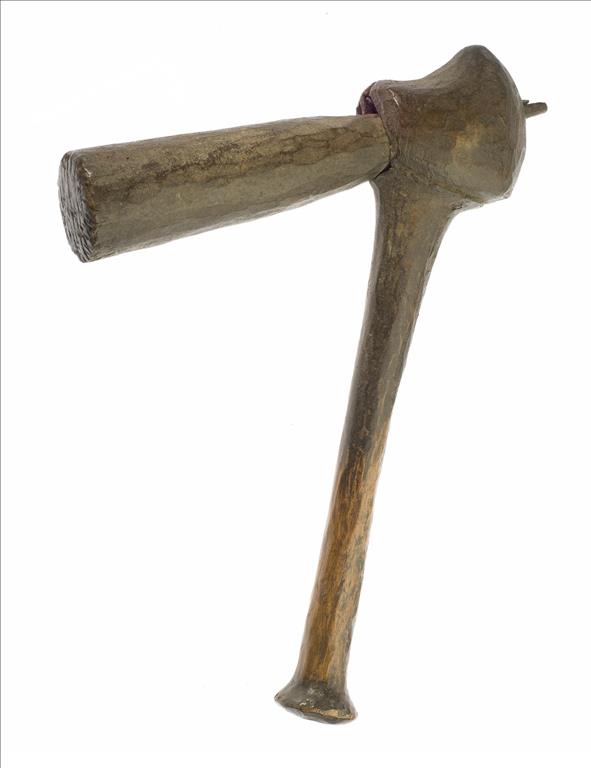 Barkcloth beater with wooden head attached to a wooden haft: Africa, Southern Africa, Malawi or Zambia, Ngoni people, early 20th century.