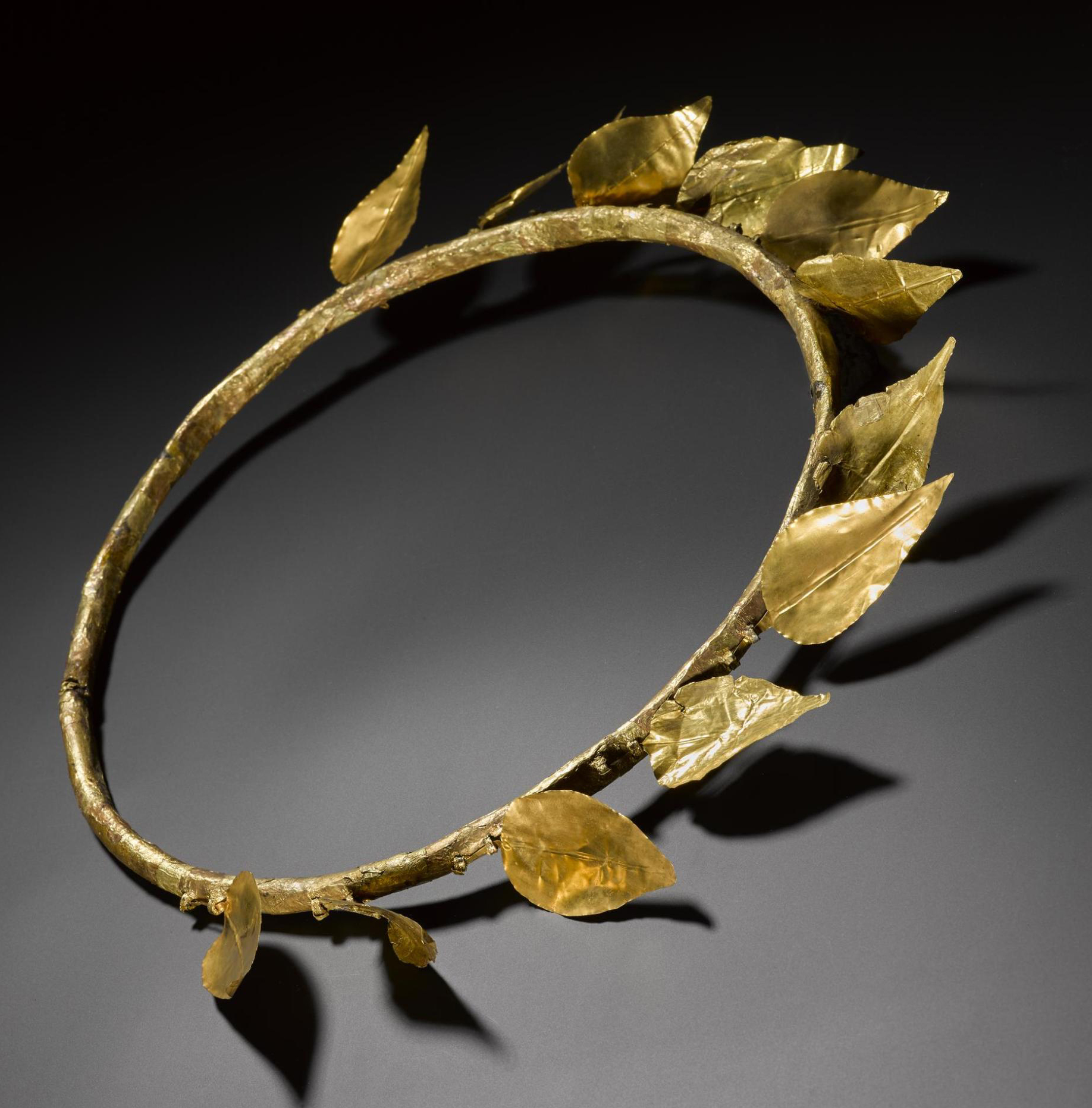 Wreath of twelve gold-foil leaves attached to a ring of copper, found on the mummy of Montsuef: Ancient Egyptian, excavated at Sheikh Abd el-Qurna, Thebes,  c.9BC