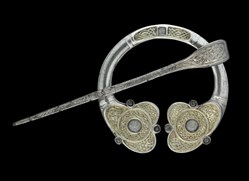 a medieval silver brooch
