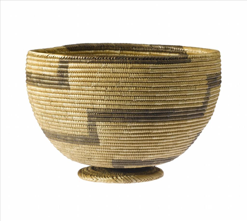 Basket-bowl of plaited grass figured with stepped bands in black: Africa, Southern Africa, Malawi or Zambia, late 19th century.