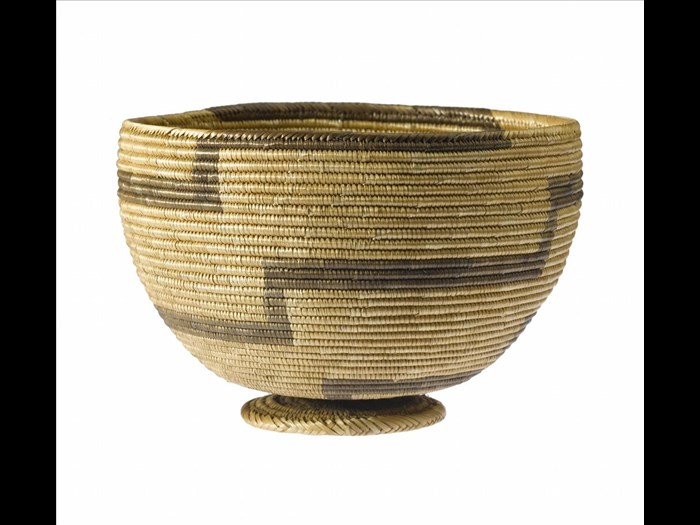 Basket-bowl of plaited grass figured with stepped bands in black: Africa, Southern Africa, Malawi or Zambia, late 19th century.