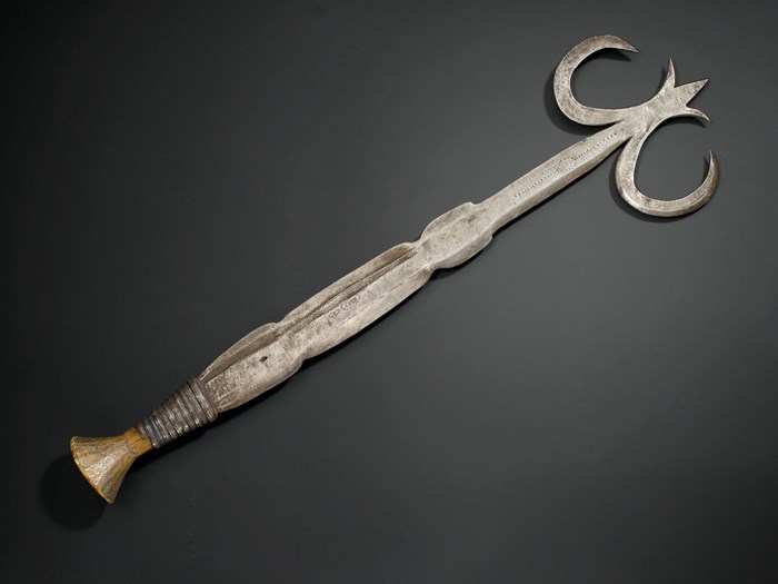 Ceremonial knife of iron with double pronged curved head and wooden handle bound with iron fillet: Africa, Central Africa, Democratic Republic of the Congo, Ngombe, early 20th century.