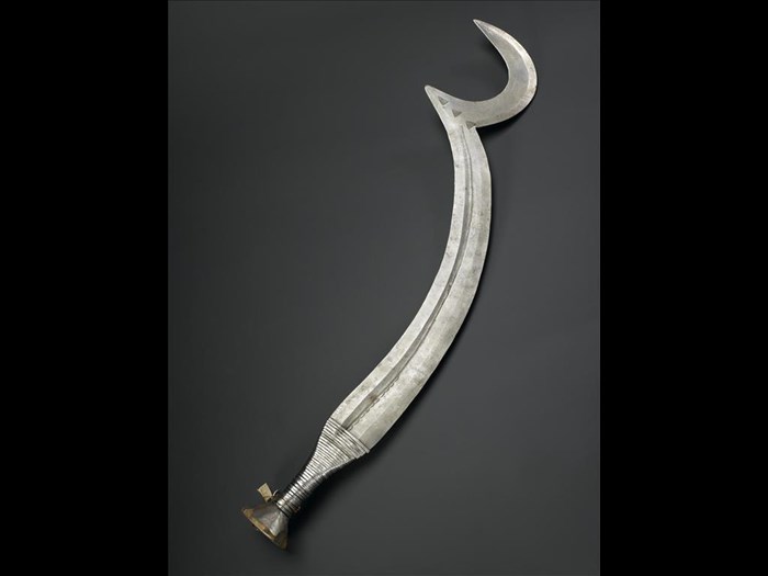 Beheadal knife of iron with crescentic point and handle of wood bound with iron fillet: Africa, Central Africa, Democratic Republic of the Congo, Ngombe, early 20th century.