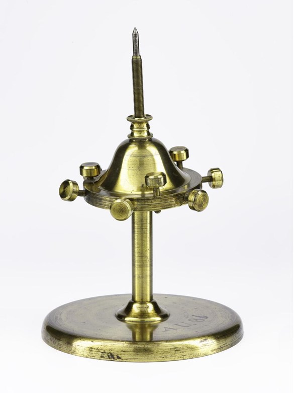 Dynamic top devised by James Clerk Maxwell for the study of gyroscopic motion, which was shown by a coloured disc (now missing) mounted on top of the object. Commissioned by Maxwell for JD Forbes, made by Smith and Ramage, Aberdeen, Scotland, 1858.