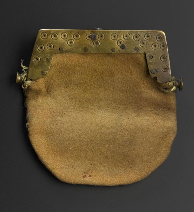 Small purse of deerskin with a rectangular brass clasp incised with dot-and-circle ornament, said to have been owned by Rob Roy MacGregor. Perthshire, 18th century.