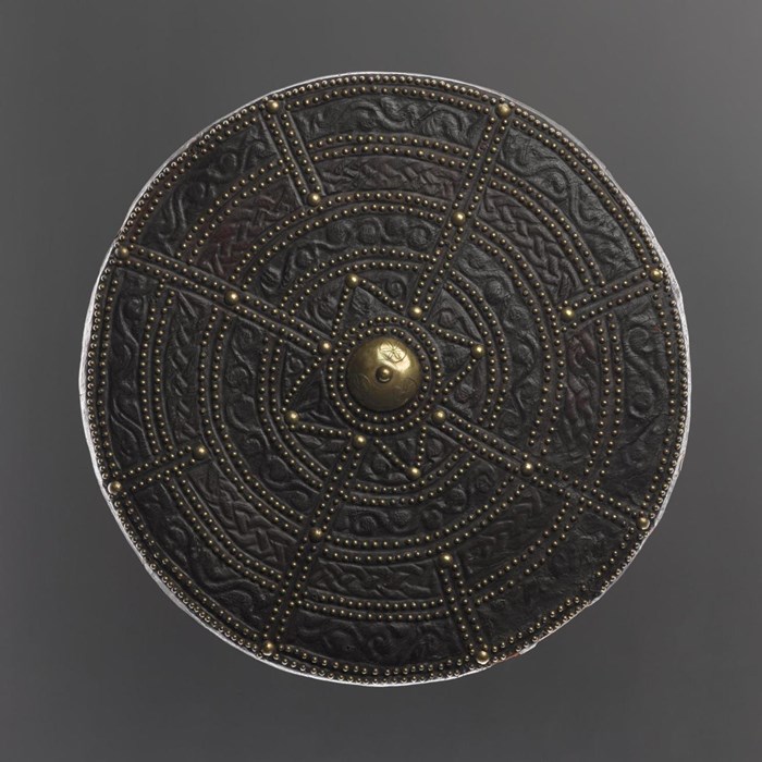 This leather targe is also reputed to have been acquired by Sir John Hynde Cotton, as an accoutrement for his tartan suit, during his visit to Scotland in 1744.