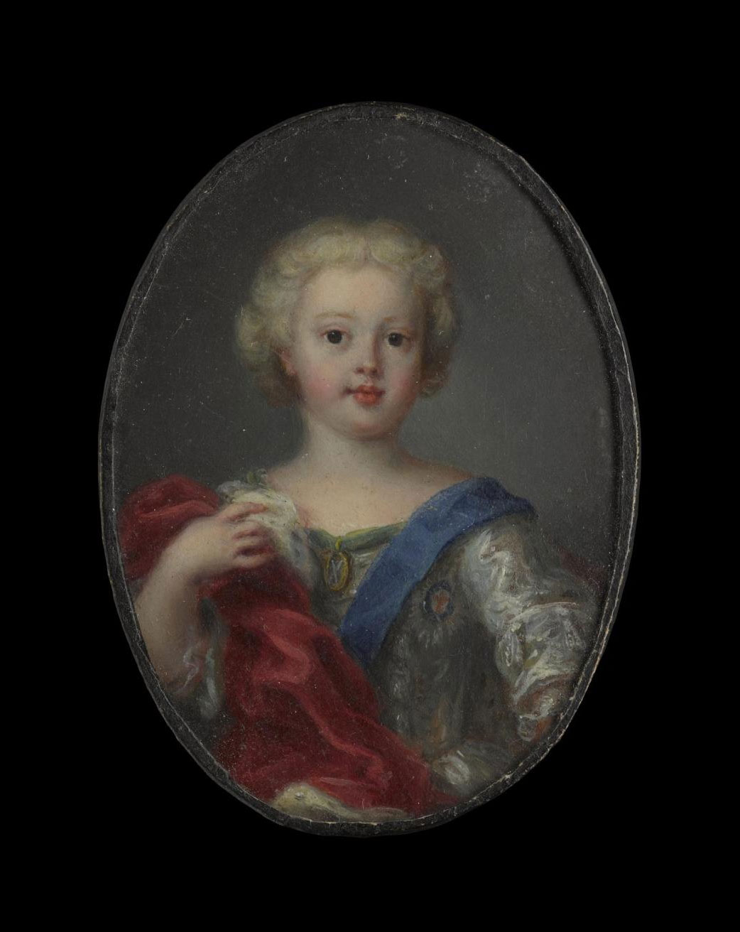 Miniature of Prince Charles Edward Stuart, at around three years old. Portrait miniatures painted in oil on copper plates of the exiled Stuart family, were popular with Jacobite supporters. These were versions of  portraits by the leading court painters.