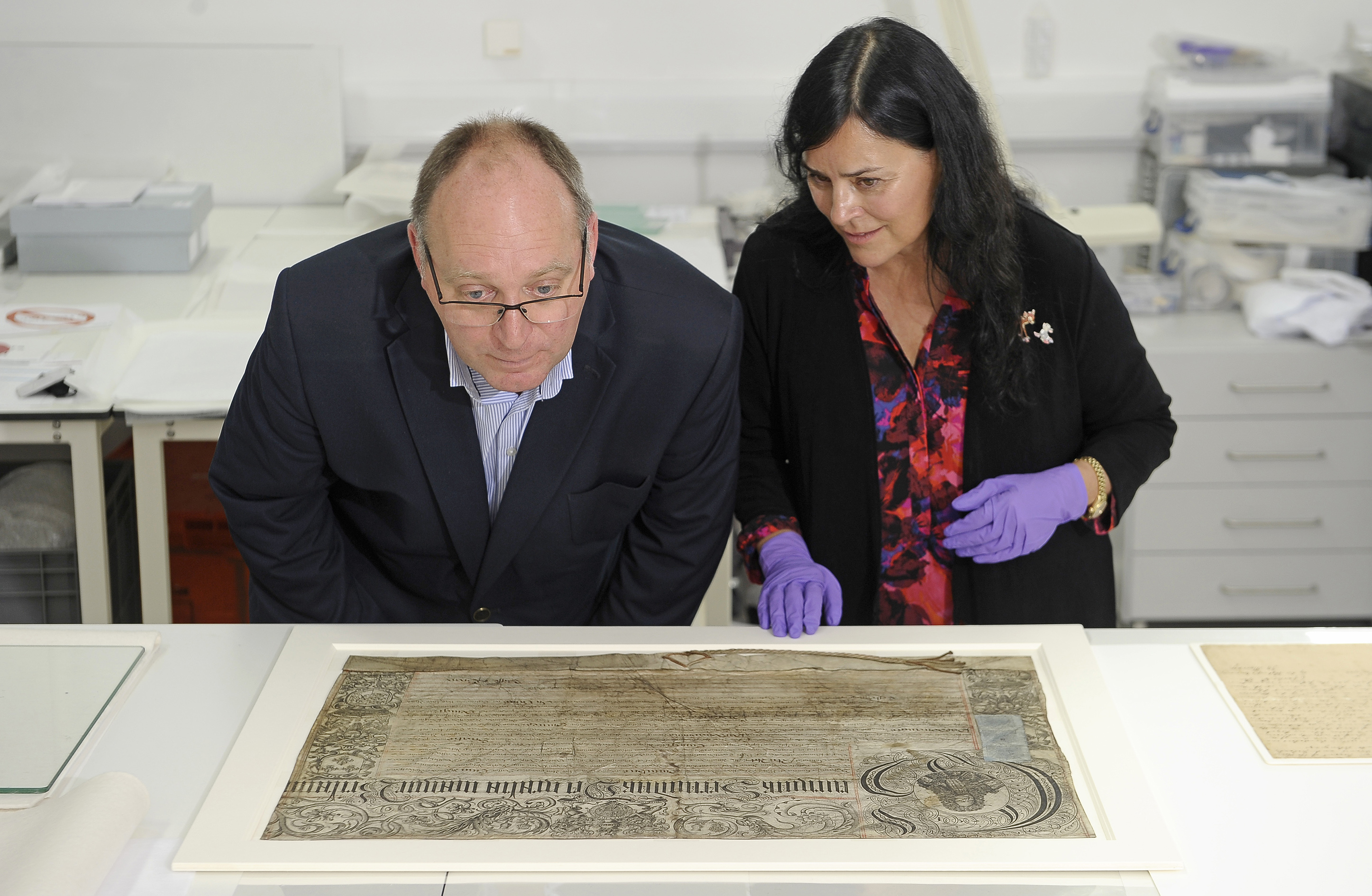 Diana  Gabaldon and David Forsyth examine a map from the Bonnie Prince Charlie and the Jacobites exhibition.
