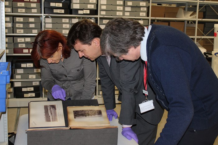 Henrietta Lidchi, Stuart Allan and Allan Massie examining archives at the National Army Museum