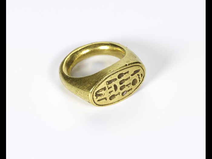 Gold finger-ring, incised on the top with the name of Queen Nefernefruaten-Nefertiti: Ancient Egyptian, Middle Egypt, Amarna, probably the Royal Tomb, New Kingdom, 18th Dynasty, reign of Akhenaten, c.1353-1336 BC.