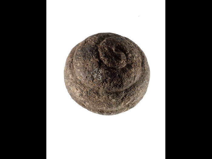 Carved stone ball with spiral ornament, from Buchan, Aberdeenshire, around 3000 BC.